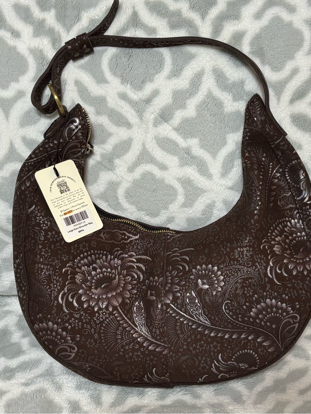 Nora PLG Sepia Embossed Floral Crescent Shoulder Bag - Brown